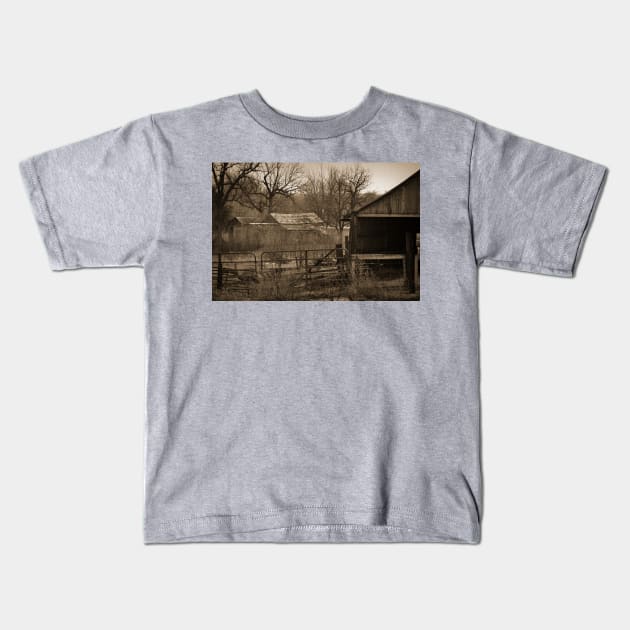 Abandoned Farm In Sepia Kids T-Shirt by KirtTisdale